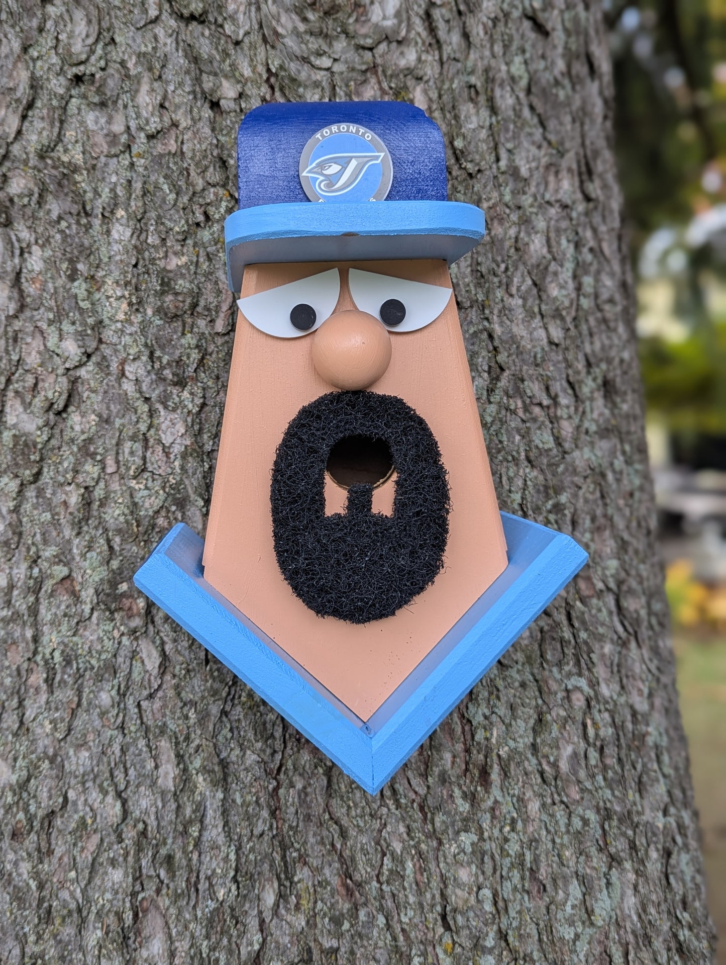 Blue Jays player with goatee birdhouse